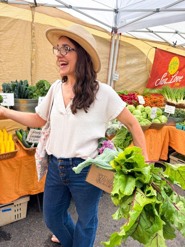 A healthy me, walking through the farmers marking & laughing with a friend.