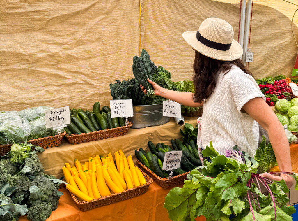 Brenna shopping at the farmers market
