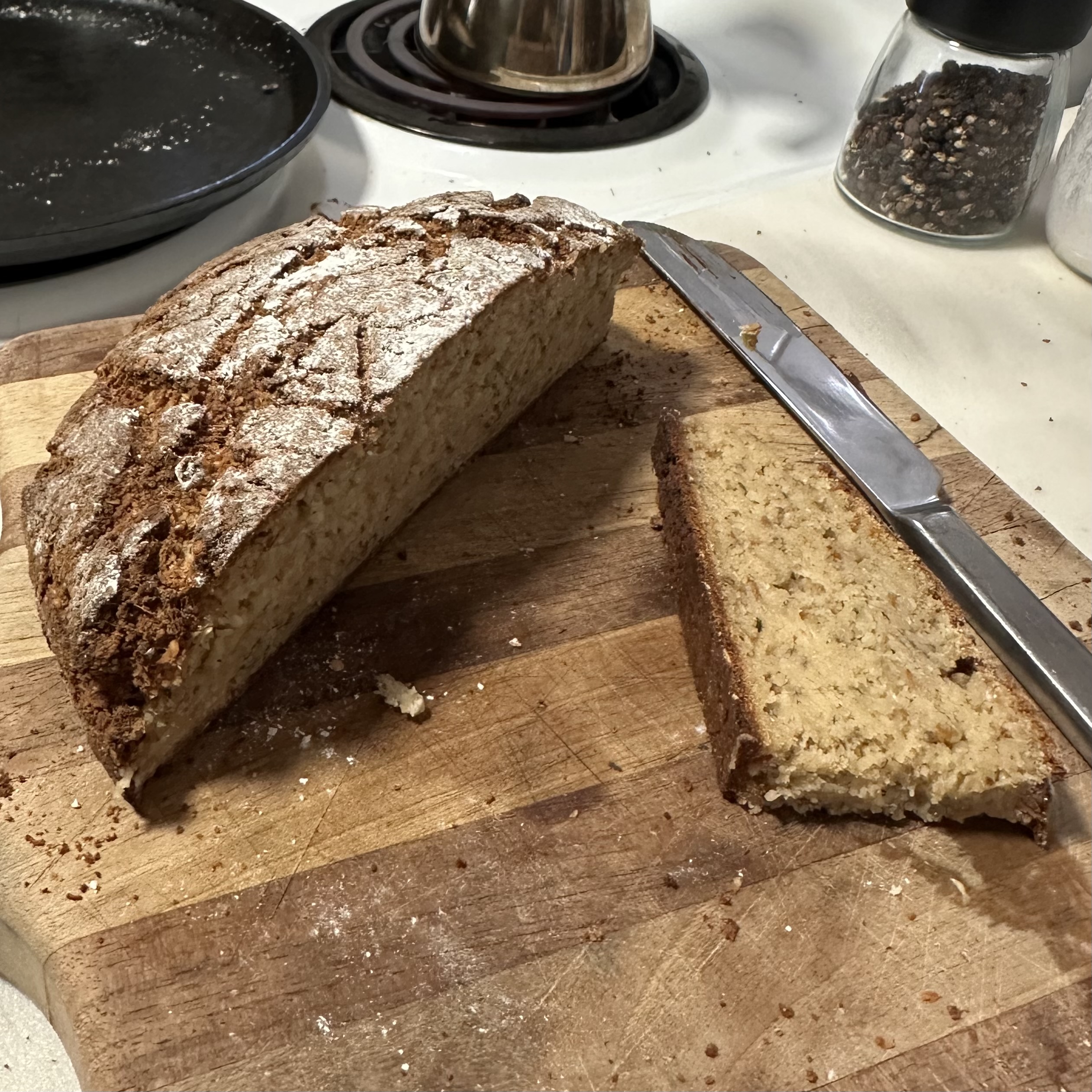 Keto protein sourdough loaf with crusty exterior and airy crumb